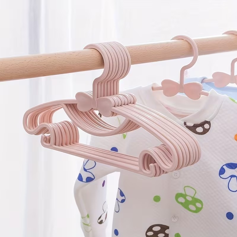 Baby Clothing Drying Rack - ไม้แขวนเสื้อพลาสติกสำหรับเด็ก 10-100 ชิ้น แบบพกพา กันลม ดีไซน์โบว์น่ารัก